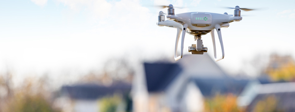 Drone filming footage of a house