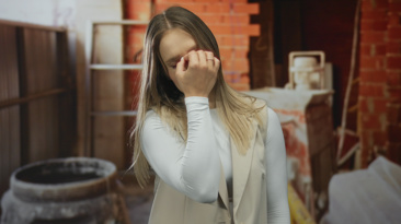 Worried homeowner in an unfinished building site
