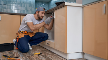 Man fixing kitchen