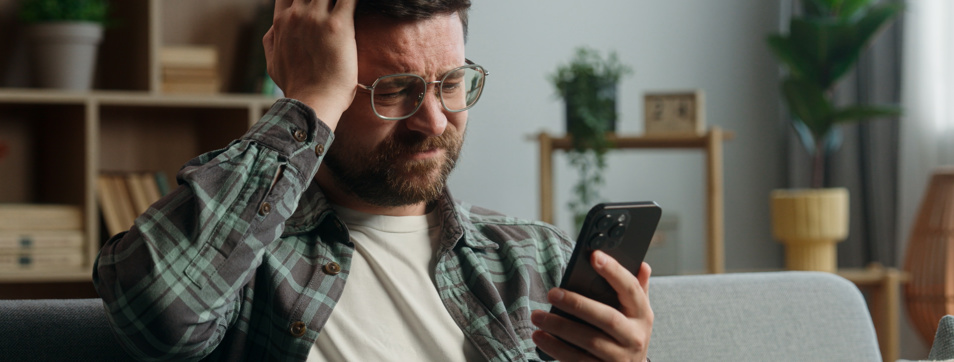 Homeowner on the phone looking worried