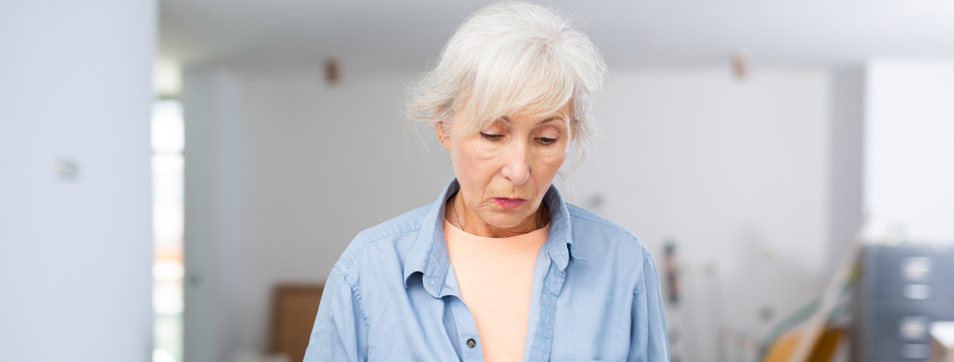 Upset homeowner evaluating documentation