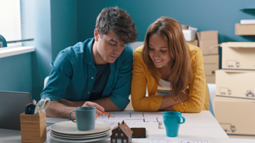 A young couple planning a project