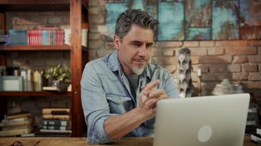 Man looking at a computer screen