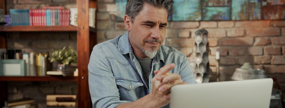 Man looking at a computer screen